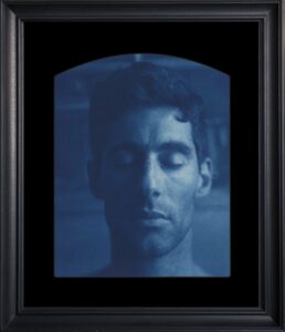 Portrait of a person with eyes closed.