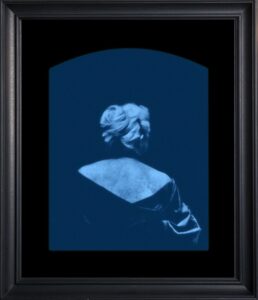 Woman's silhouette in dark blue tones.