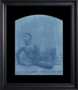 Framed artistic nude in blue tone.
